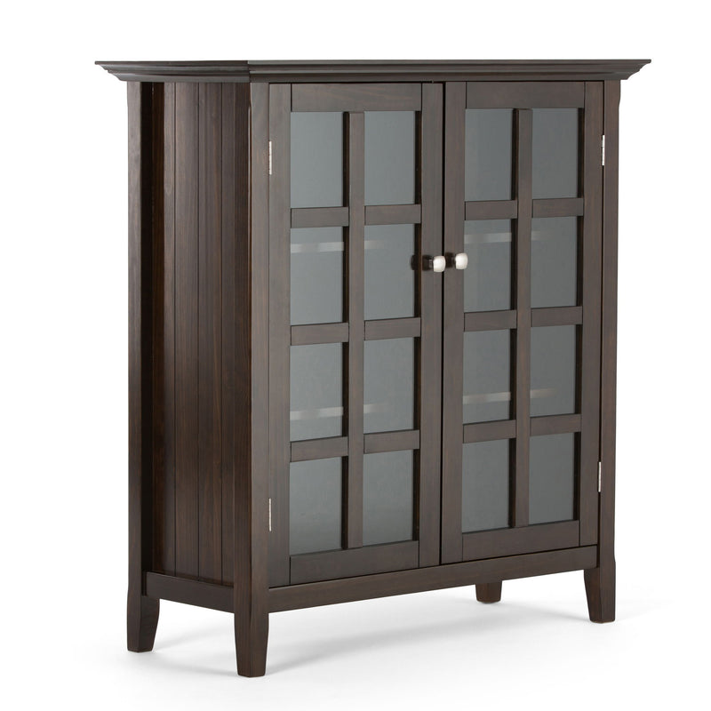 Medium storage cabinet with two glass doors in dark brown, silver knob hardware.