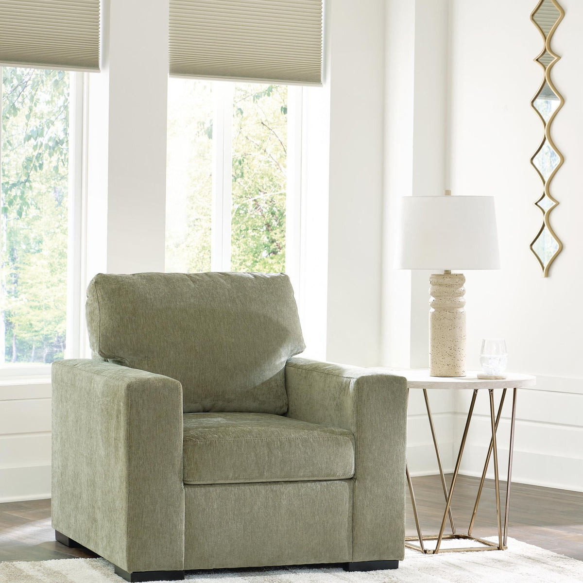 Moss green single-seat armchair with supportive seat cushion and backrest