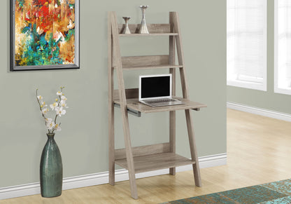 Light brown leaning computer desk with open shelves and laptop platform