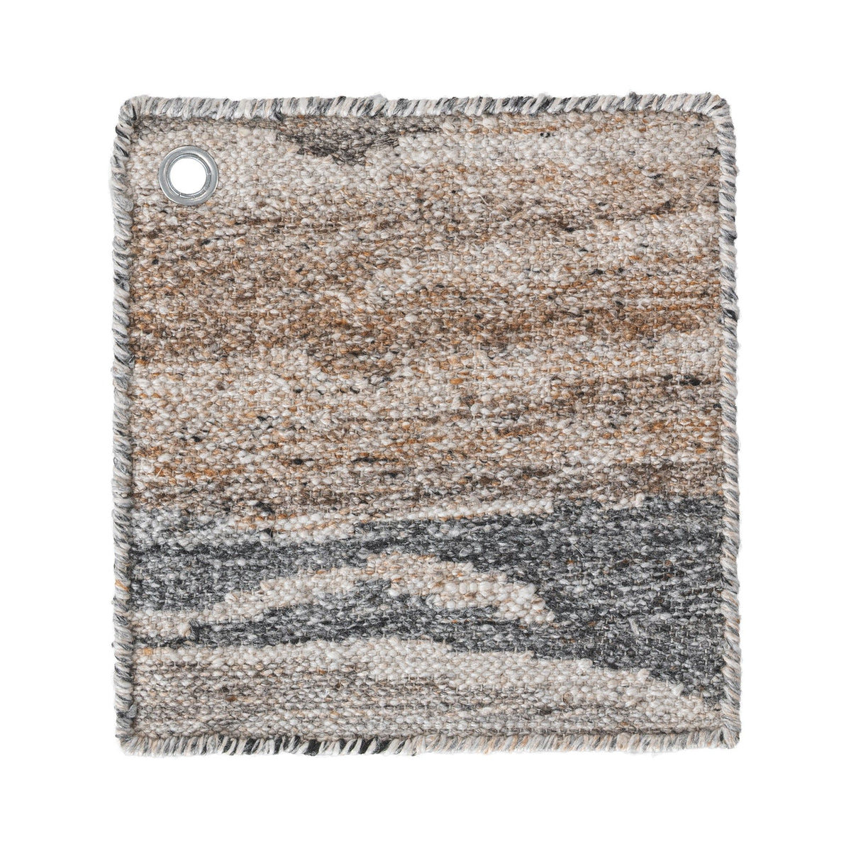 Rectangular area rug corner with braided fringe edge; beige, tan, and gray abstract weave; grommet