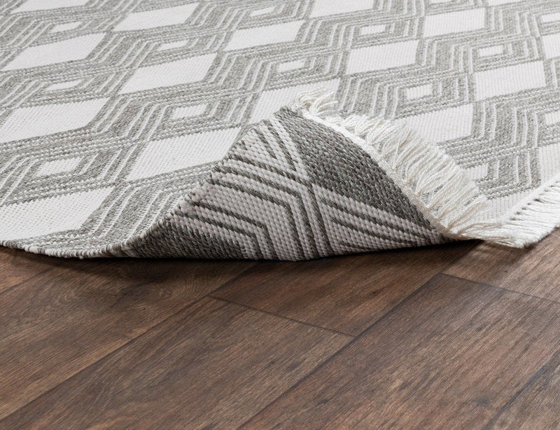 Banning indoor/outdoor rug, charcoal gray with white diamond chevron pattern