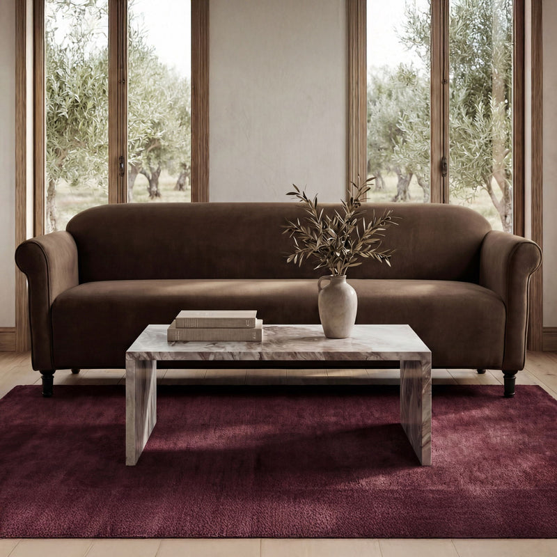Dark brown faux mohair sofa with rolled arms and low seat cushion