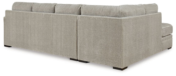 Beige corner chaise sectional sofa with rectangular arms and box seat cushions