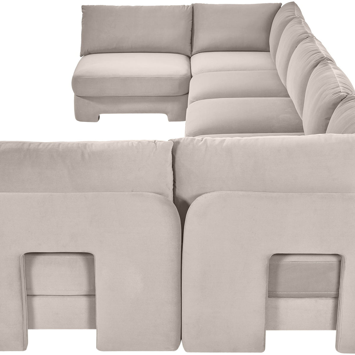 Light gray velvet performance fabric U-shaped armless sectional with plush seat cushions.