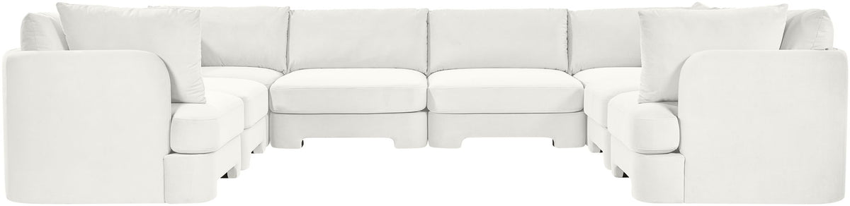 White velvet U-shaped sectional sofa with tufted look and padded armrests