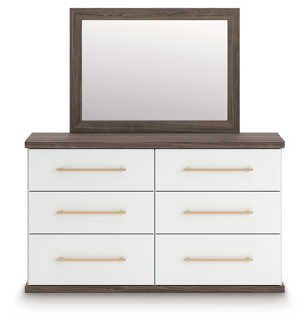 Dark wood dresser with mirror, white drawer fronts and brushed gold bar pulls