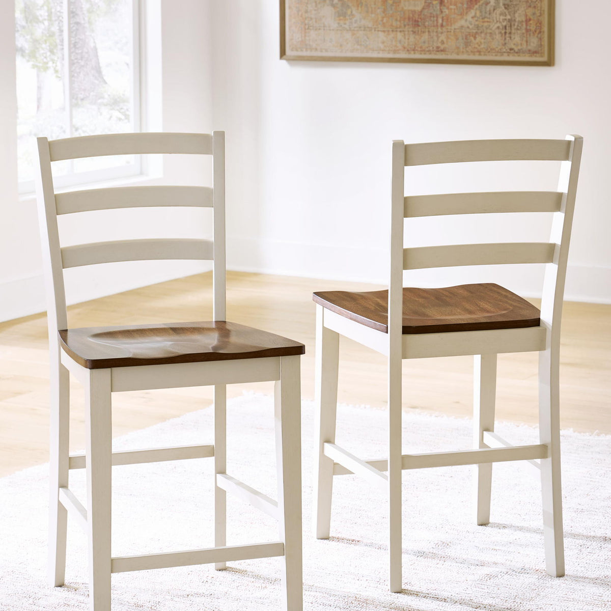 Two brown wood barstools with antique white frames, ladder backs, square seats
