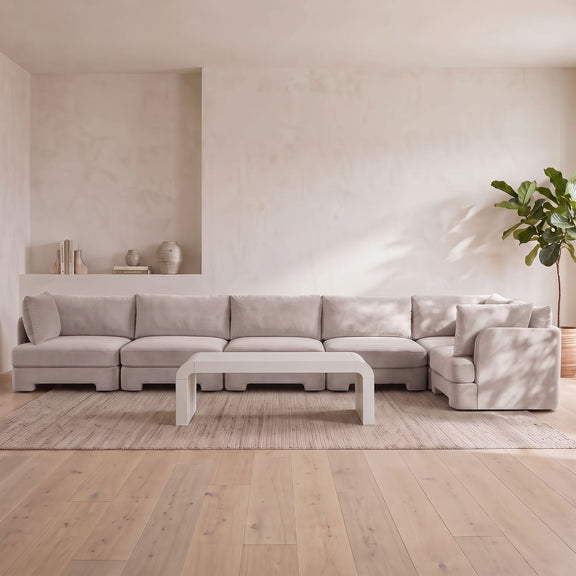 Beige velvet upholstered L-shaped sectional sofa set with 6 pieces and ottoman