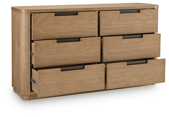 Light brown wood dresser with six drawers and black bar handles