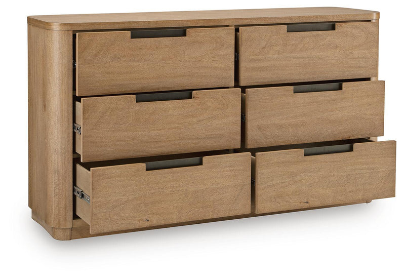 Light brown wood dresser with six drawers and black bar handles