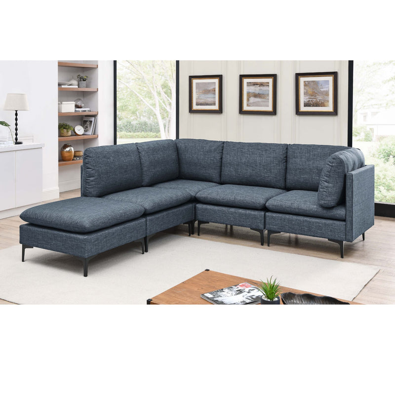 Blue modular sectional sofa with tall legs, chaise ottoman, thick upholstered cushions