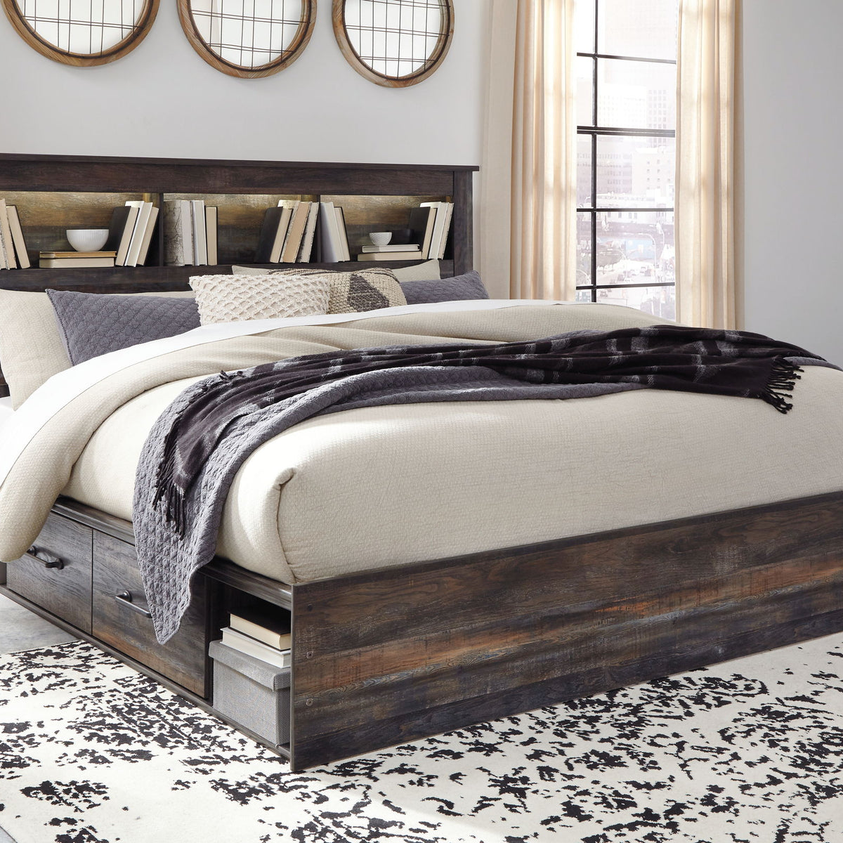 Panel bookcase bed with open shelf headboard and dark wood frame, side storage drawers.
