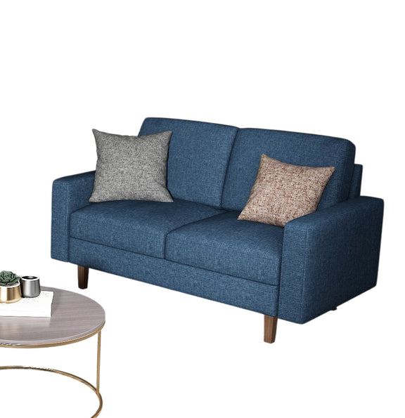 Blue two-seat loveseat with removable cushions, decorative pillows, and wooden legs