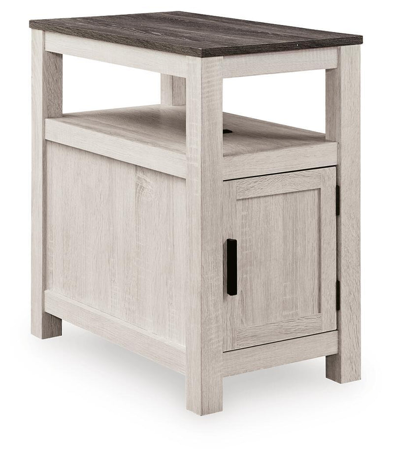 Chair side end table in whitewashed wood with open shelf and cabinet door