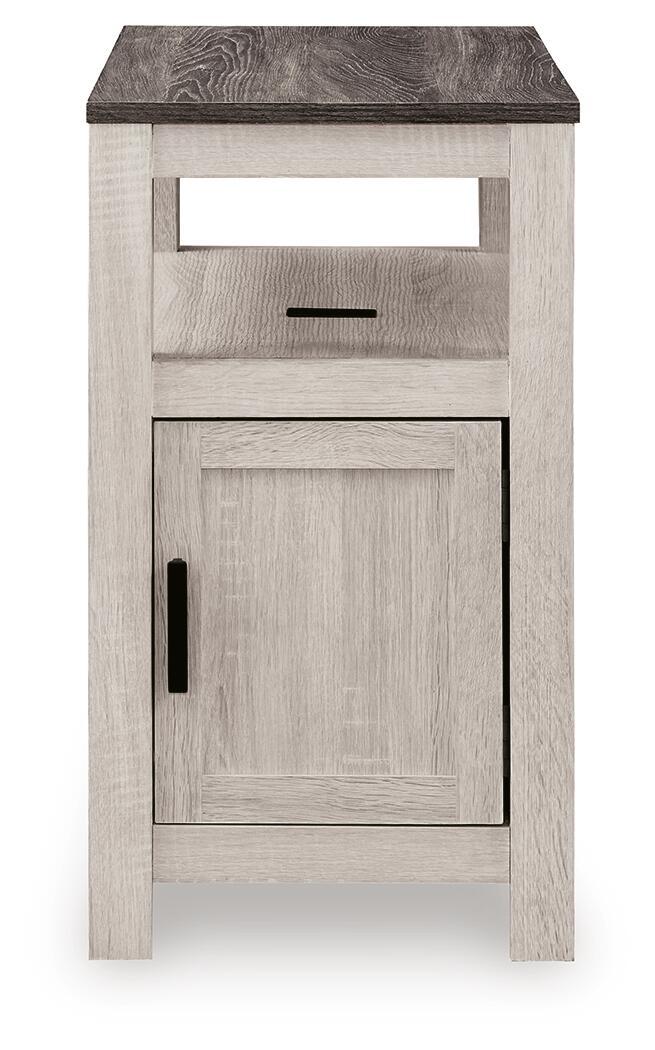 Chair side end table in whitewashed wood with open shelf and cabinet door