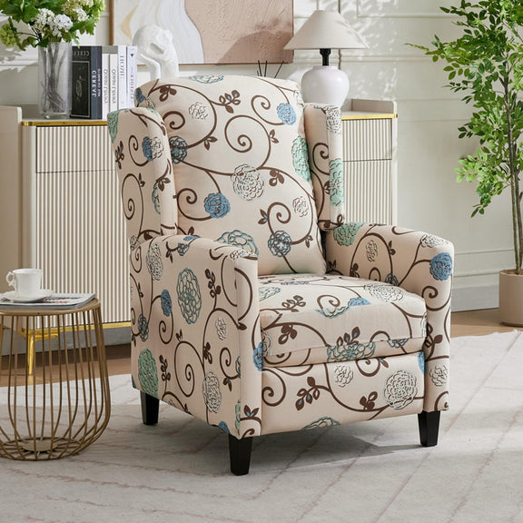 Beige wingback recliner chair with blue floral upholstery and padded arms