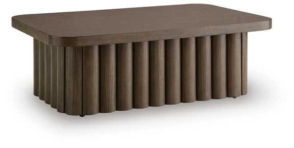 Dark brown rectangular table with fluted vertical wood panel base and flat tabletop