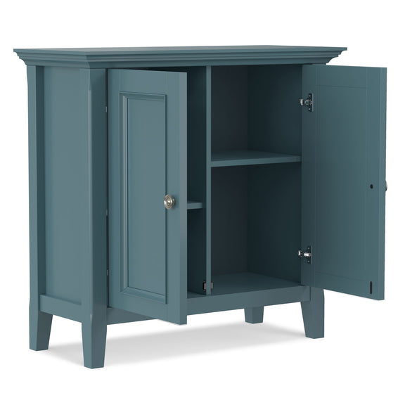 Blue two-door storage cabinet with doors open to reveal interior shelves