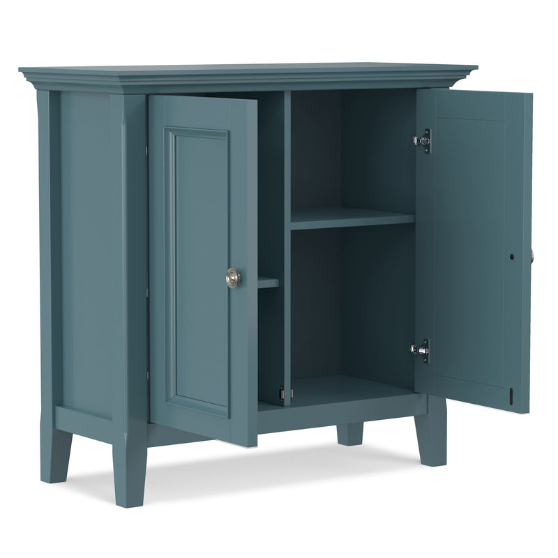 Blue two-door storage cabinet with doors open to reveal interior shelves