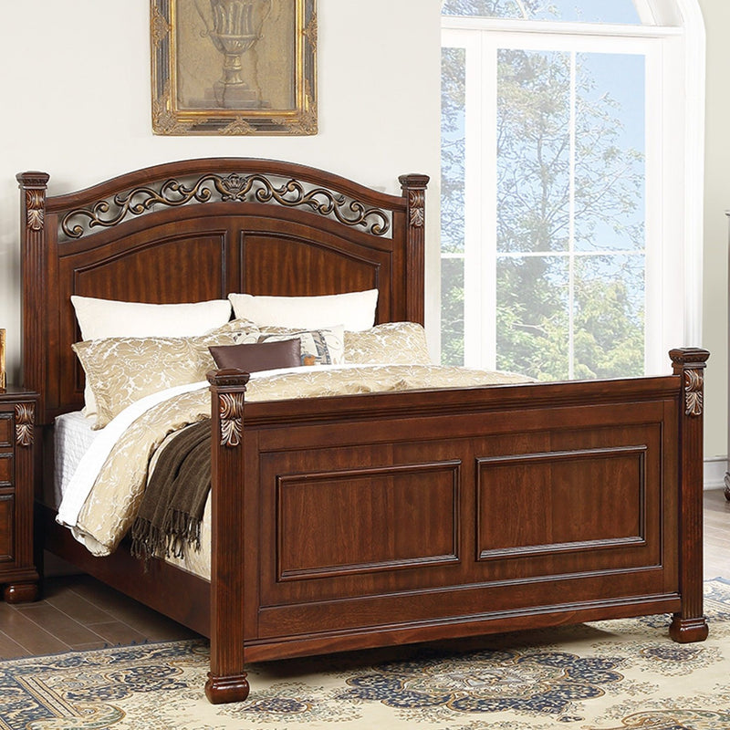 Bed With Ornate Carvings And Curved Headboard