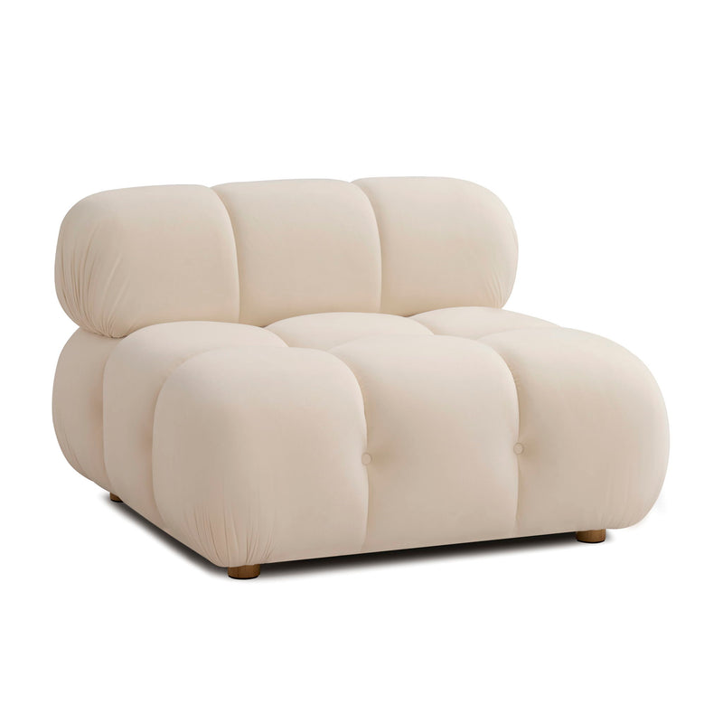 Light beige armless modular chair with padded seat/back blocks and tapered wooden feet