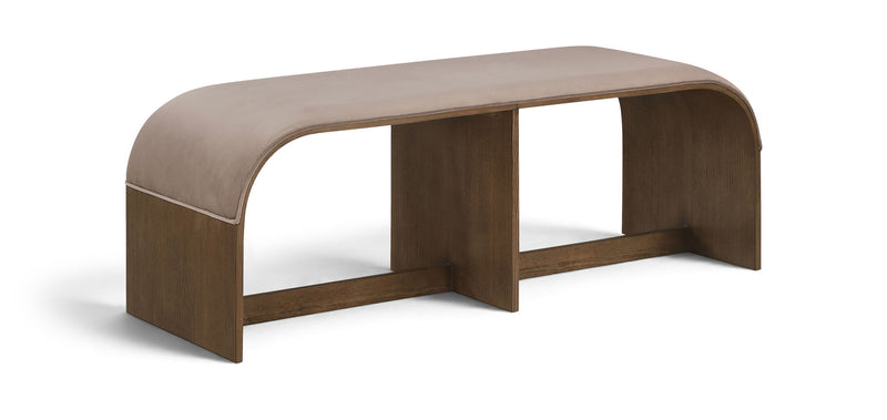 Beige upholstered velvet bench with curved end panels and open center frame