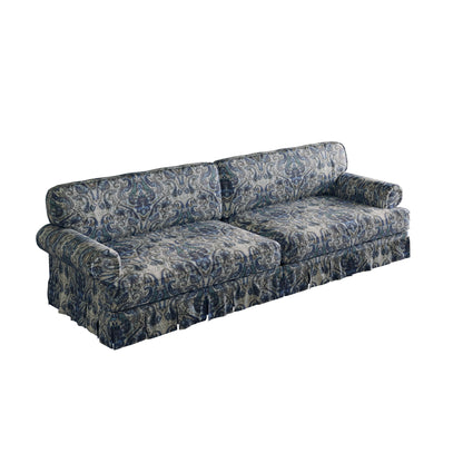 Blue patterned loveseat sofa with rolled arms and pleated skirt ruffle, two-seat