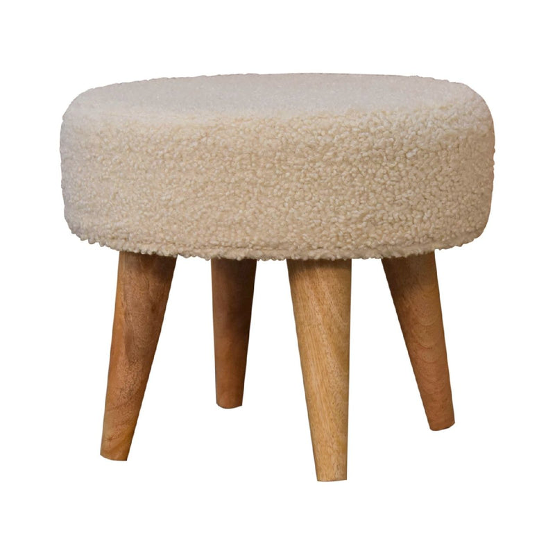 Cream boucle round footstool with tapered wooden legs