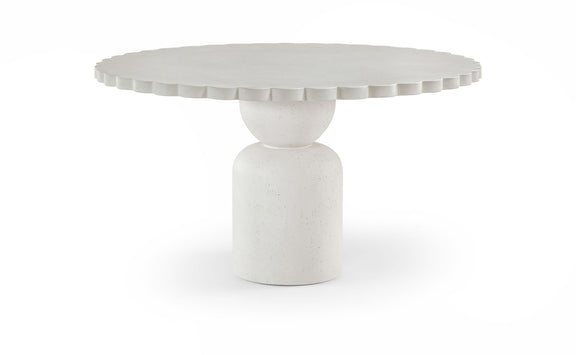 Round indoor/outdoor table with fluted edge top and cylindrical pedestal base in light white.