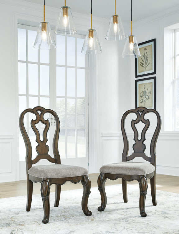 Set of 2 Maylee dining side chairs with dark brown carved backs and gray upholstered seats