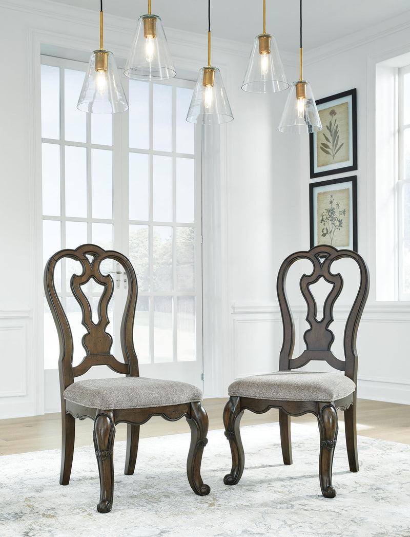 Set of 2 Maylee dining side chairs with dark brown carved backs and gray upholstered seats