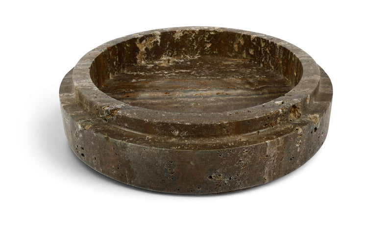 Dark travertine bowl with round low profile and speckled stone texture