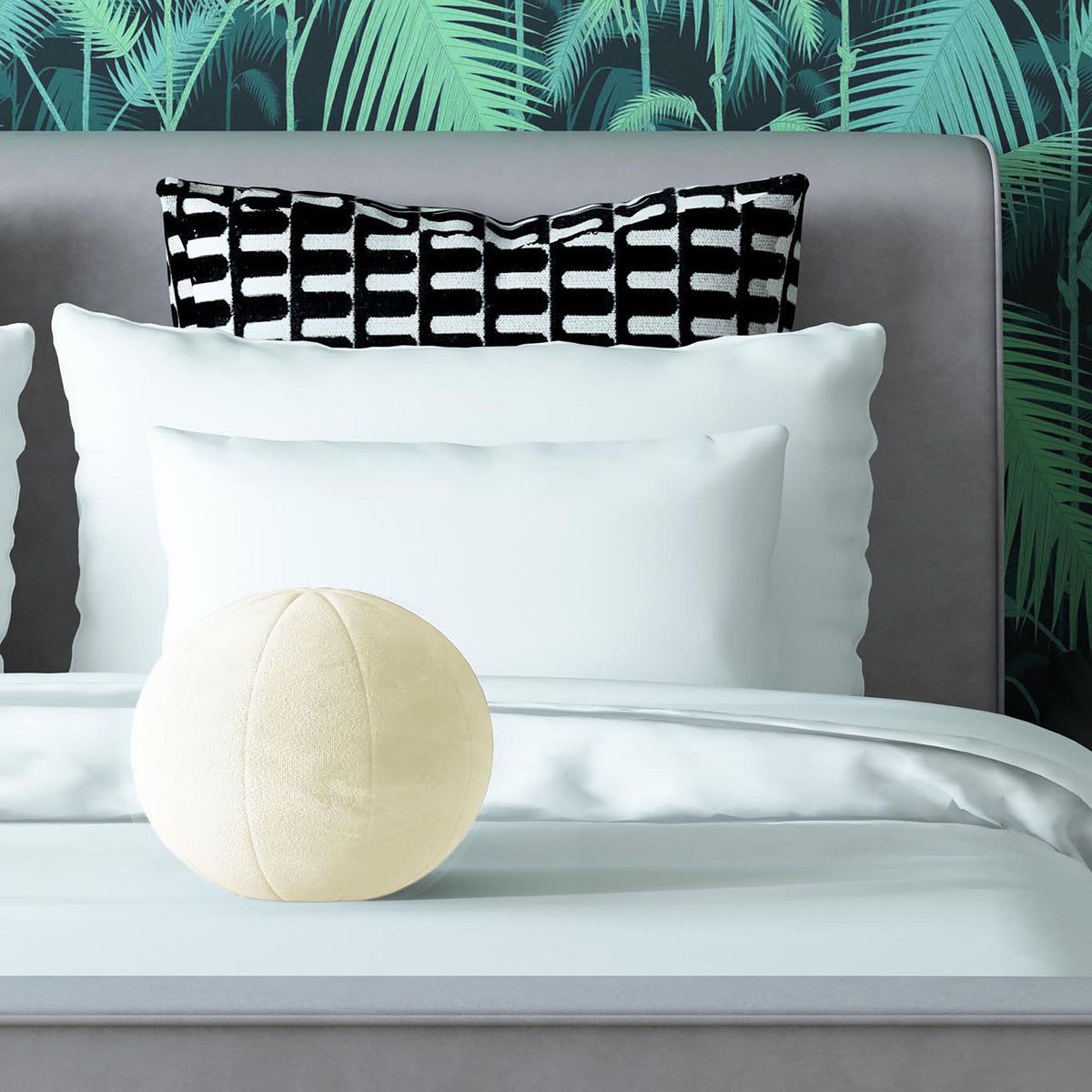 Beige round Boba-style throw pillow, front view with central seam