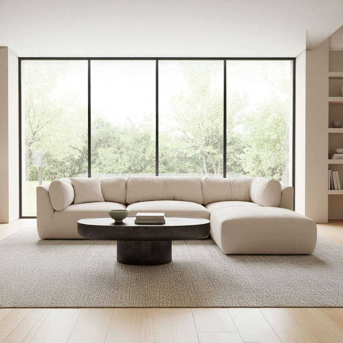 Oatmeal modular sectional sofa with chaise, rounded cushions and plush arms