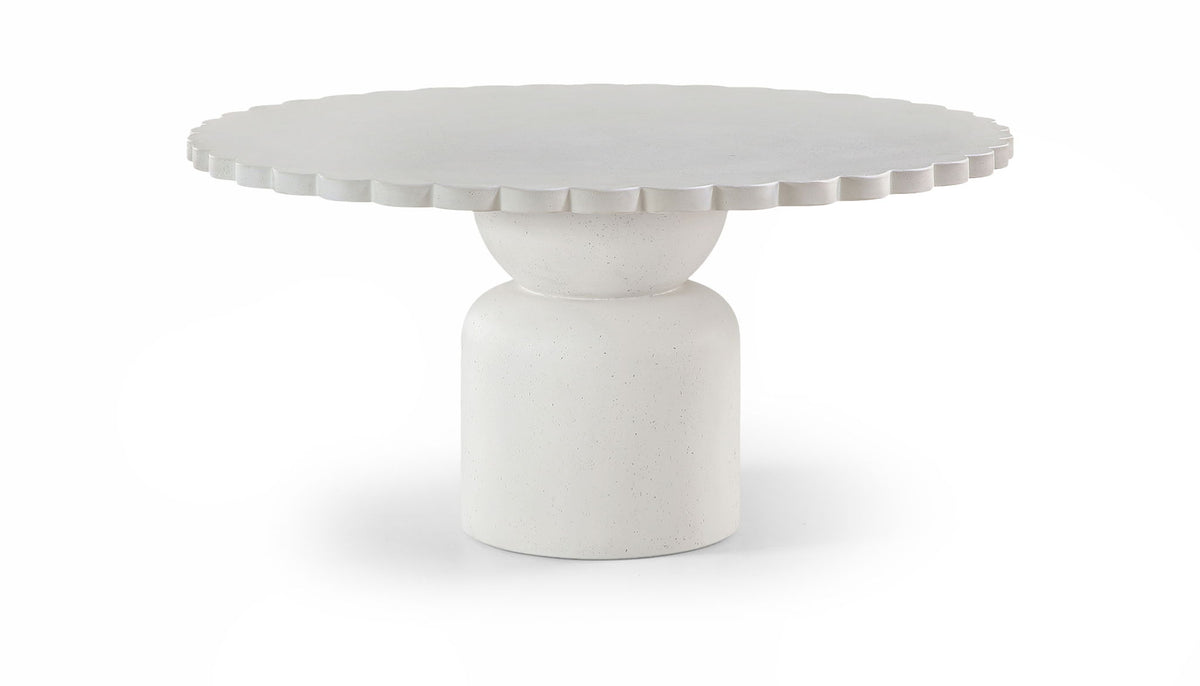Round indoor/outdoor table with textured round top and pedestal base in light white.
