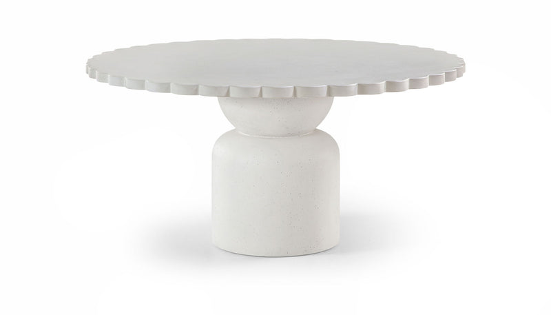 Round indoor/outdoor table with textured round top and pedestal base in light white.