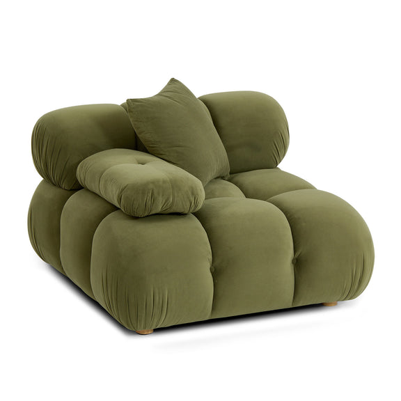 Green modular corner chair angled view with curved back cushions and bolstered arms.