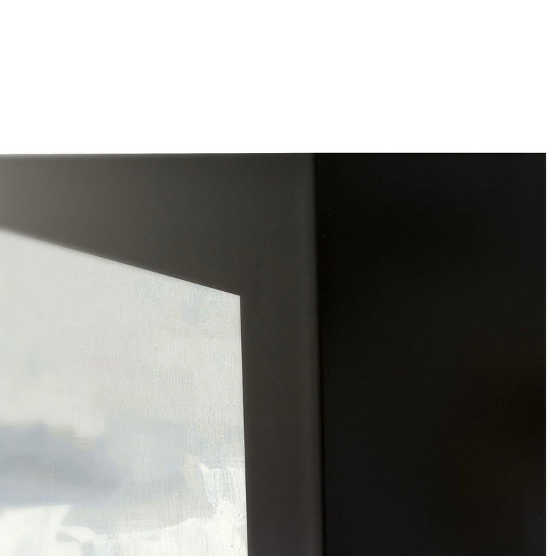 Framed painting corner with black frame and white border