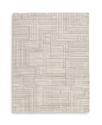 Gray washable rug with geometric line pattern in light and medium shades