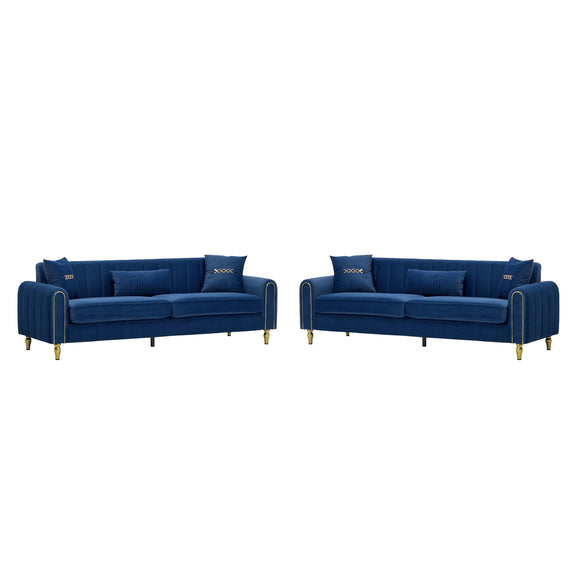 Two blue three-seat sofas with channel-tufted arms, cushions, and gold-tone feet