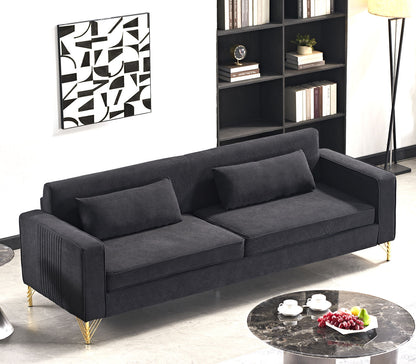 Black 3-seater sofa with plush seat cushions and two matching throw pillows