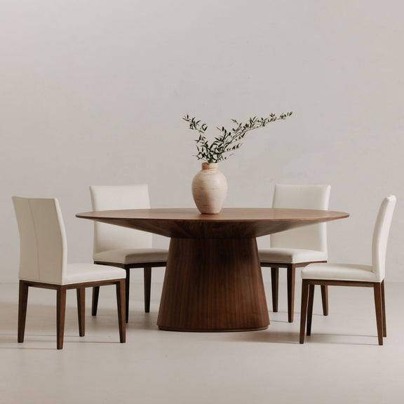 Natural walnut oval dining table with tapered pedestal base