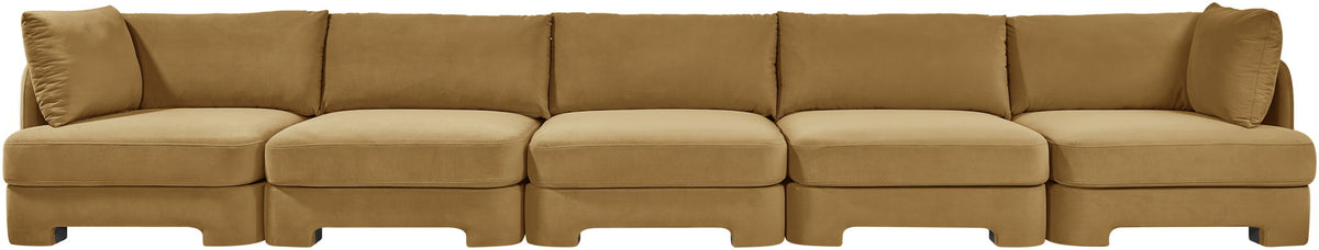 Tan velvet upholstered sectional sofa with modular seats and raised armrests