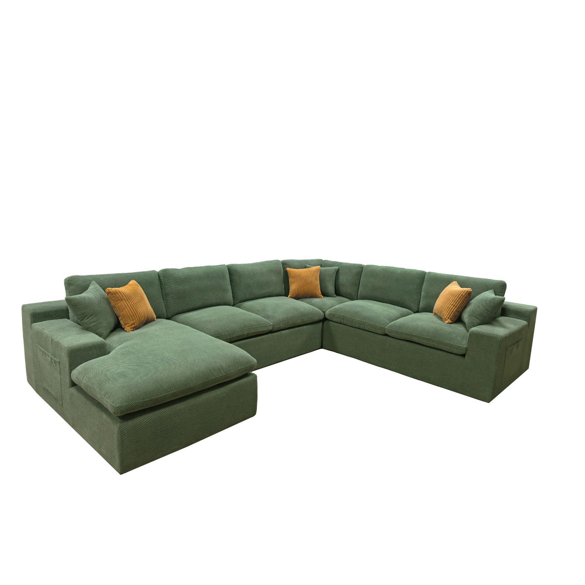 Green U-shaped sectional sofa with chaise cushions and two yellow accent pillows