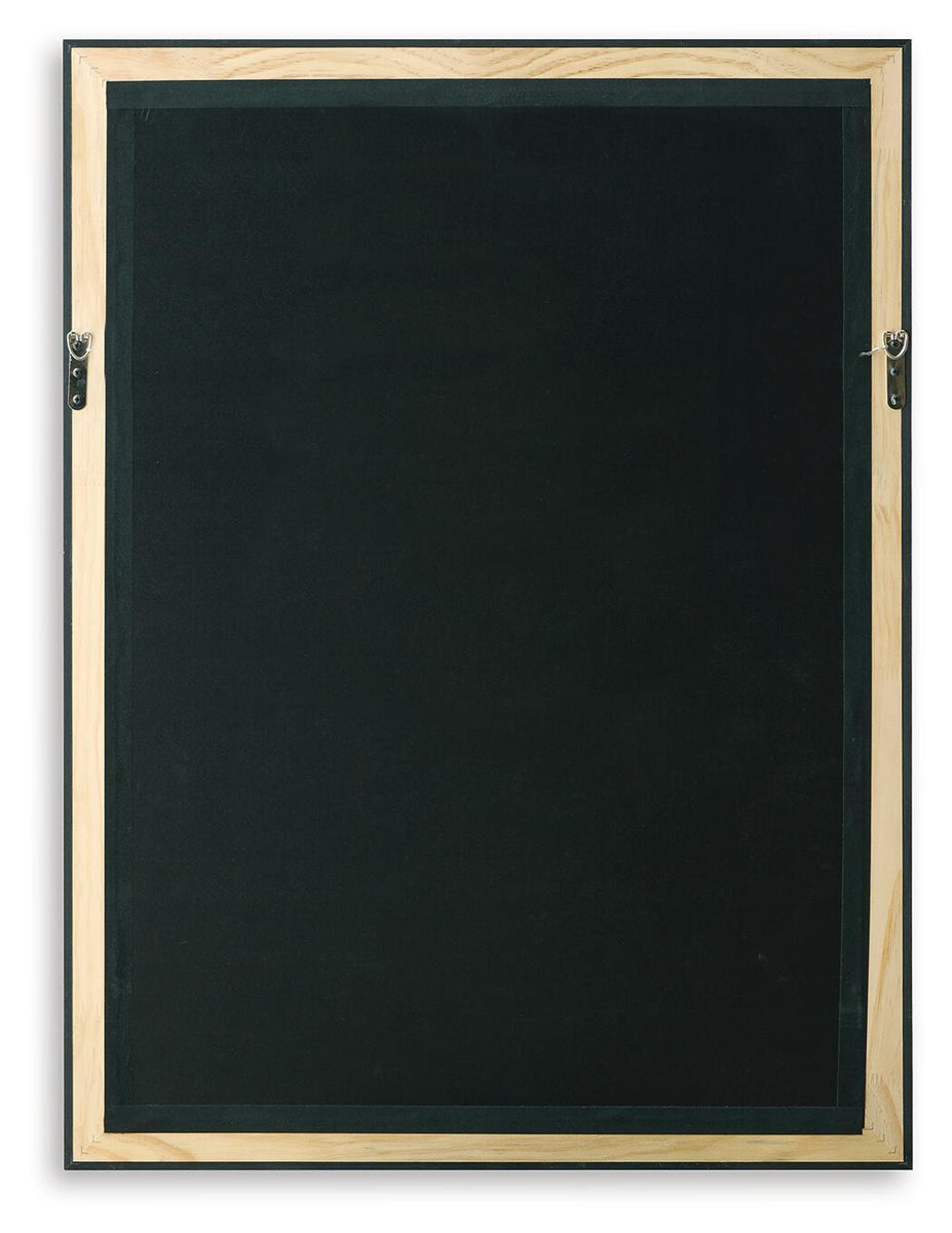 Framed wall art back panel with black surface and gold-toned mounting hardware