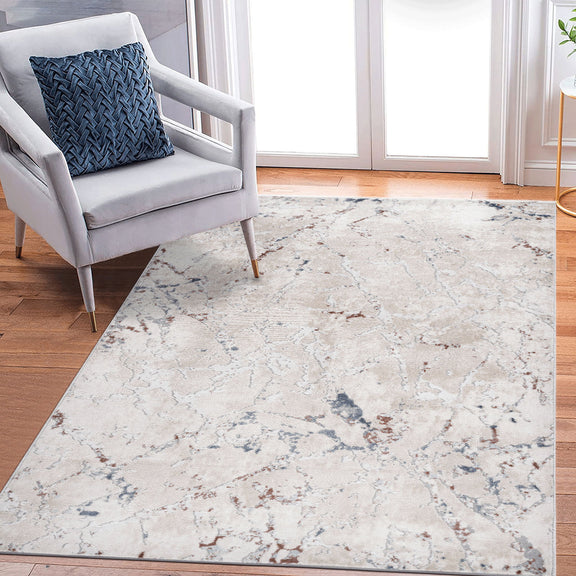 Light gray rectangular area rug with distressed blue abstract lines, corner view