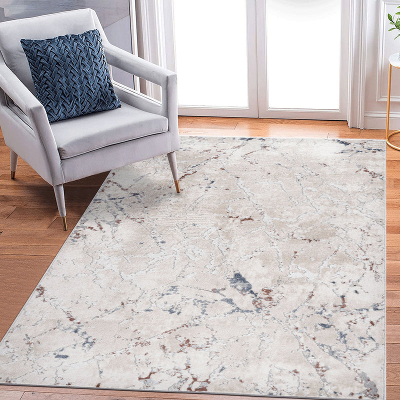 Light gray rectangular area rug with distressed blue abstract lines, corner view