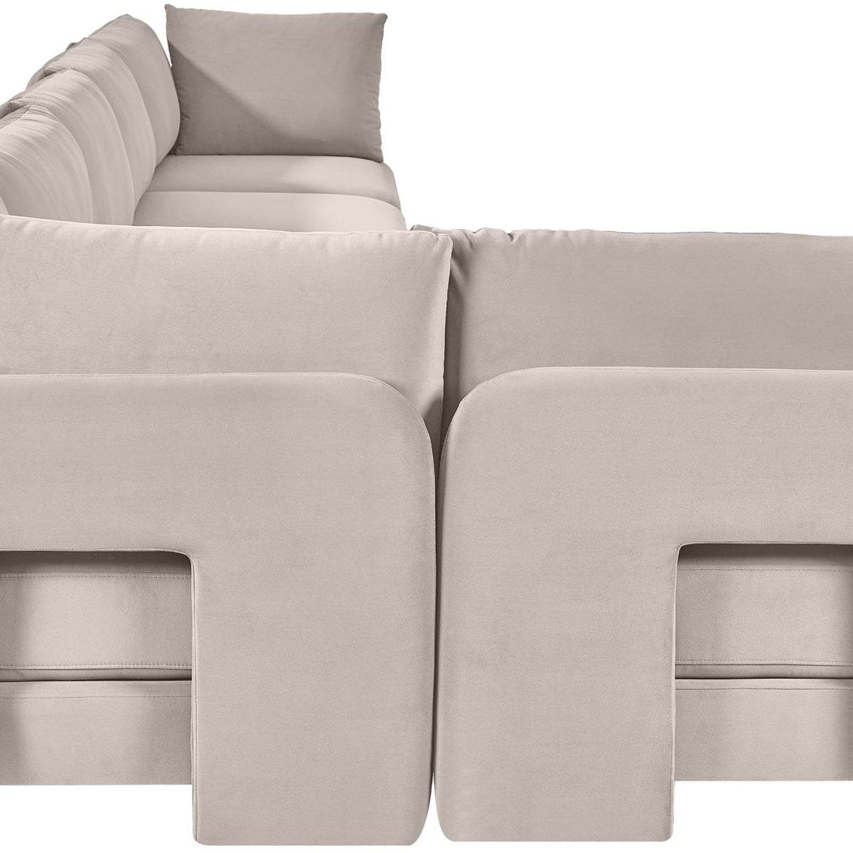 Light gray velvet upholstered L-shaped sectional with 6 pieces and arm cushions