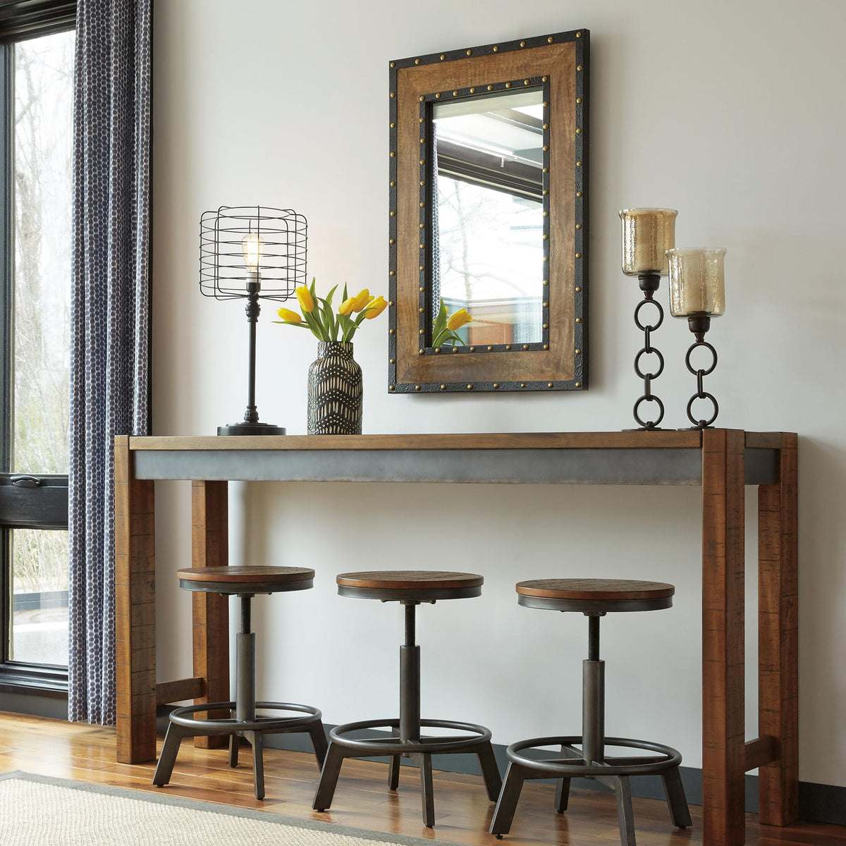 Dark brown long counter table with thick top and angled support braces