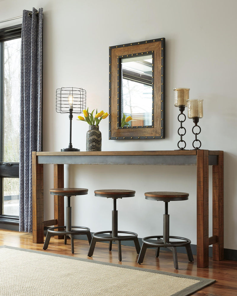 Dark brown long counter table with thick top and angled support braces